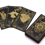 Mazzo di tarocchi EZ-Shoppy nero con decorazioni in lamina d'oro, incluse carte singole e mazzo completo.