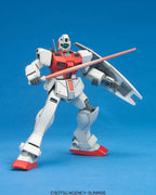 Gundam action figure in white and red, holding a beam saber and shield against a blue background.