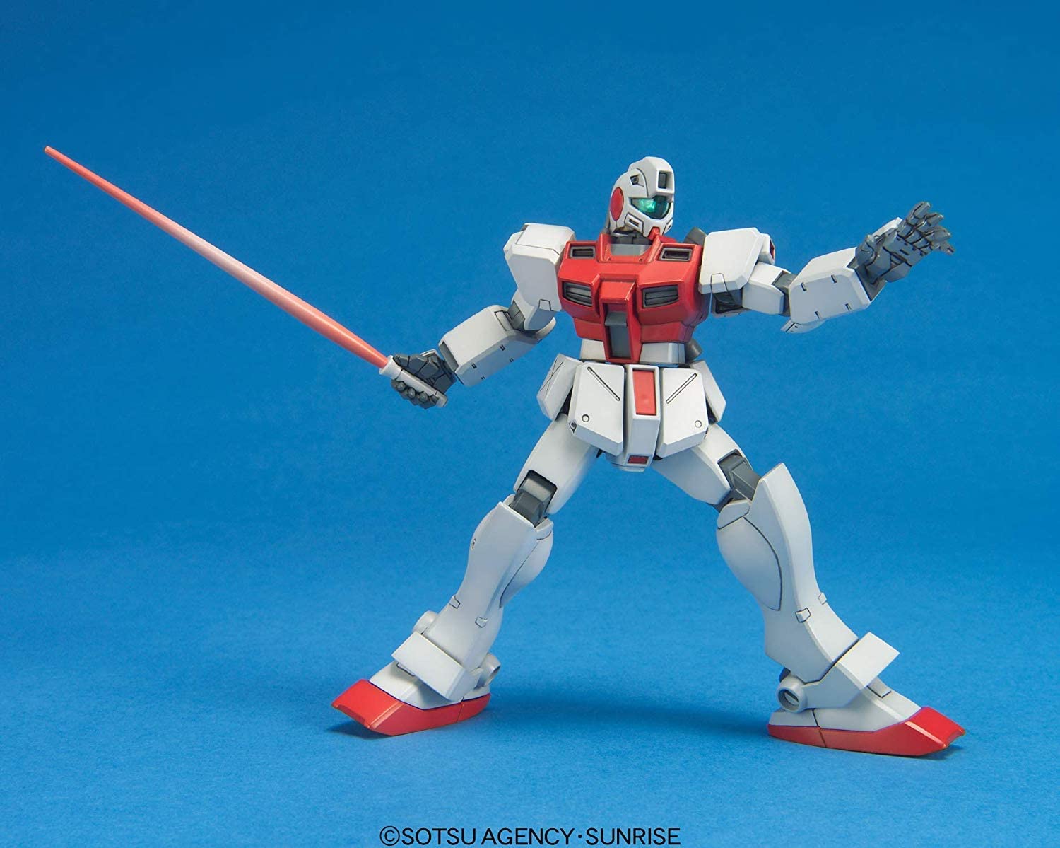 White and red Gundam action figure in a dynamic pose holding a pink beam saber against a blue background.