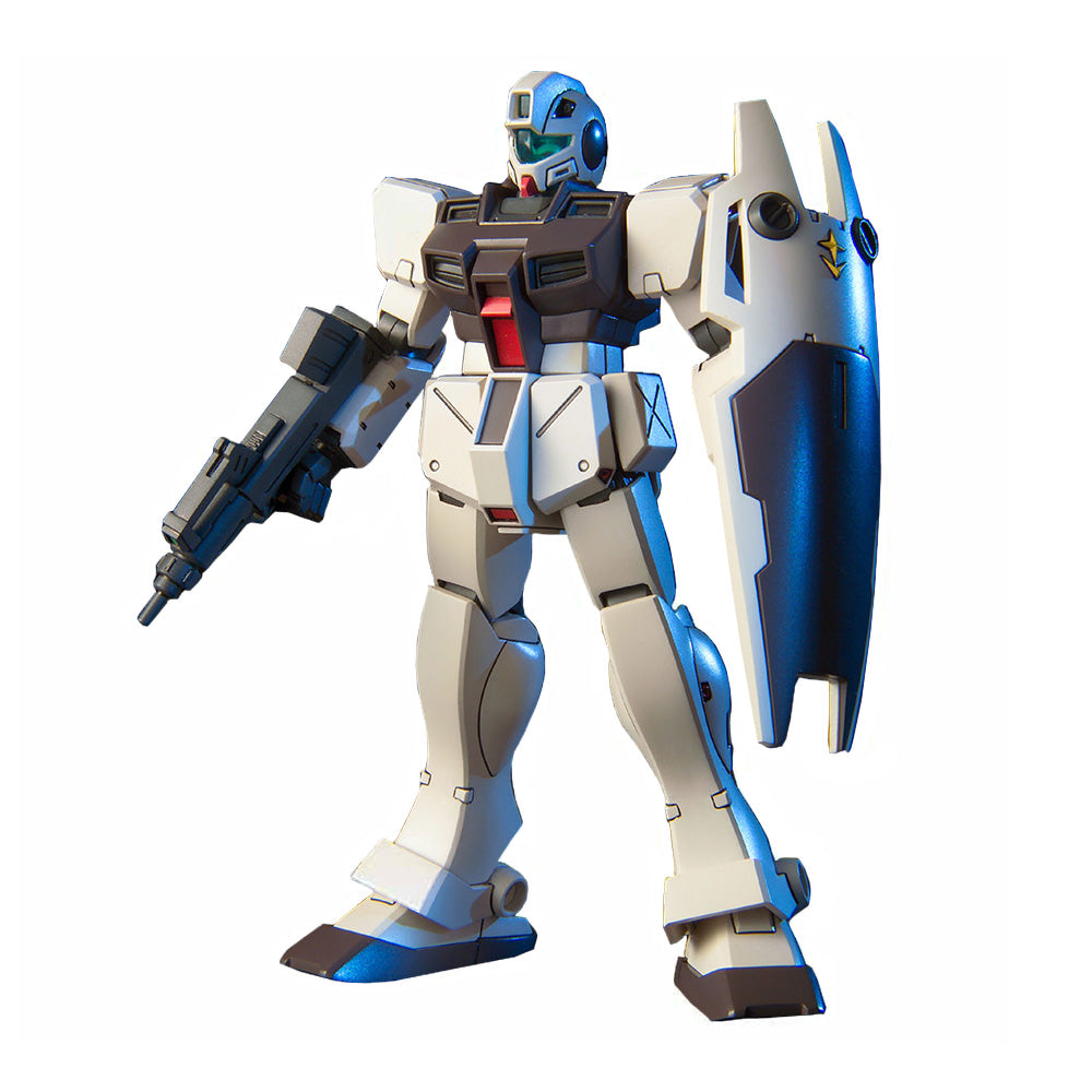 White and dark blue Gundam model kit holding a rifle and shield against a white background.