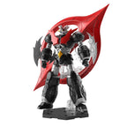 Mazinger ZERO action figure in black and silver with a large red wing-like back piece, on a hexagonal display base.
