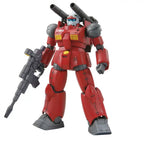 Model kit Bandai HG 1:144 Guncannon Cucuruz Doan's Island: robot rosso con cannoni sulle spalle e fucile.