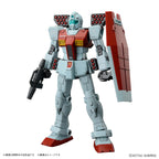 Model kit Bandai HG 1/144 GM con missile pod, fucile e scudo, in posa frontale su sfondo bianco.