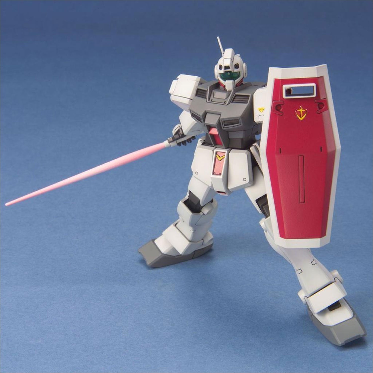 White and gray Gundam model kit holding a pink beam saber and a red shield, posed against a blue background.