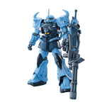 Light blue Gundam model kit with horned shoulders, dark blue armor accents, and a large gatling gun weapon.
