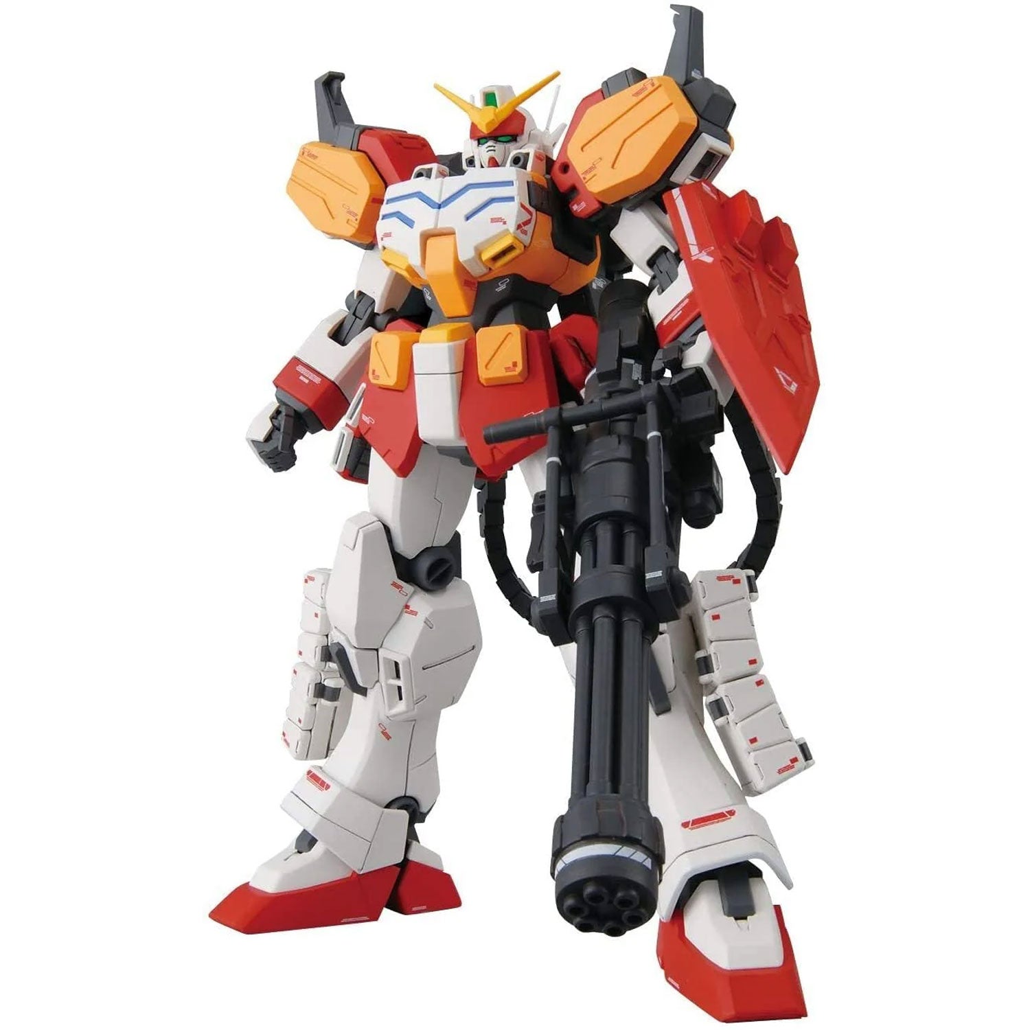 Gundam Heavyarms model kit in red, white, and orange, featuring a large gatling gun and detailed robotic armor.