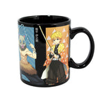 Tazza nera Demon Slayer Just Funky 473ml con grafiche di Inosuke e Zenitsu, effetto cambia colore.