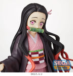 Statua PVC Nezuko Kamado "Sibling Bond" 19 cm, primo piano del personaggio con kimono rosa e bavaglio in bambù.