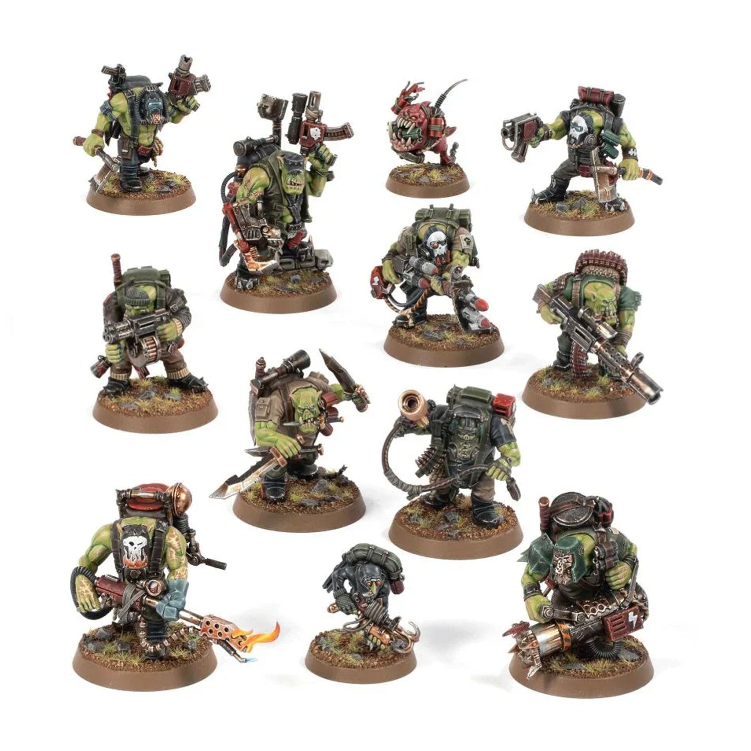 A set of Warhammer 40k Ork Kommandos miniatures, painted in green with detailed weapons, gear, and rocky bases.