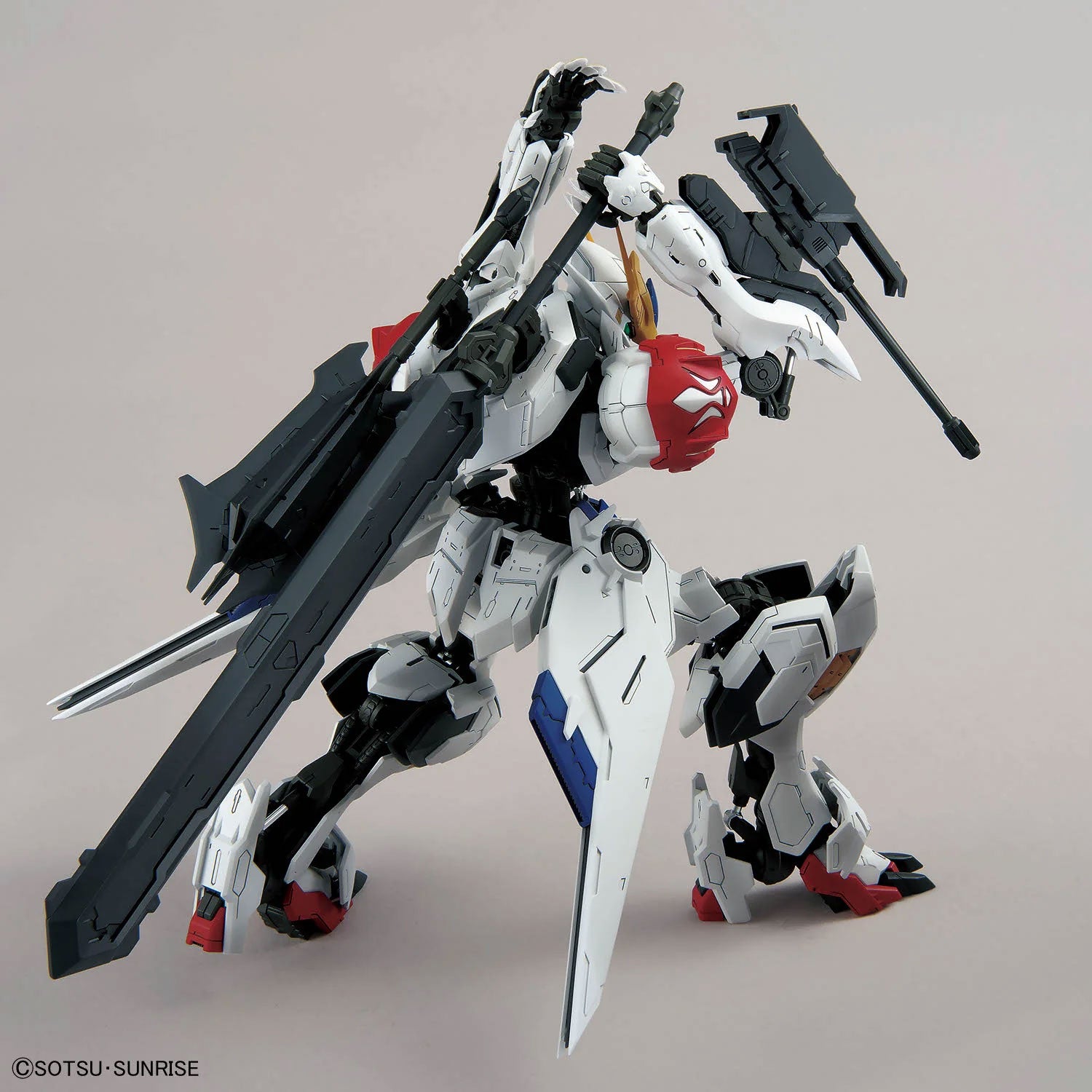 Gundam Barbatos Lupus Rex model kit, white, red, and blue mecha figure posing with a large black sword.