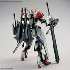 Back view of a white, red, and grey Gundam model kit carrying a large sword and mounted heavy weaponry.