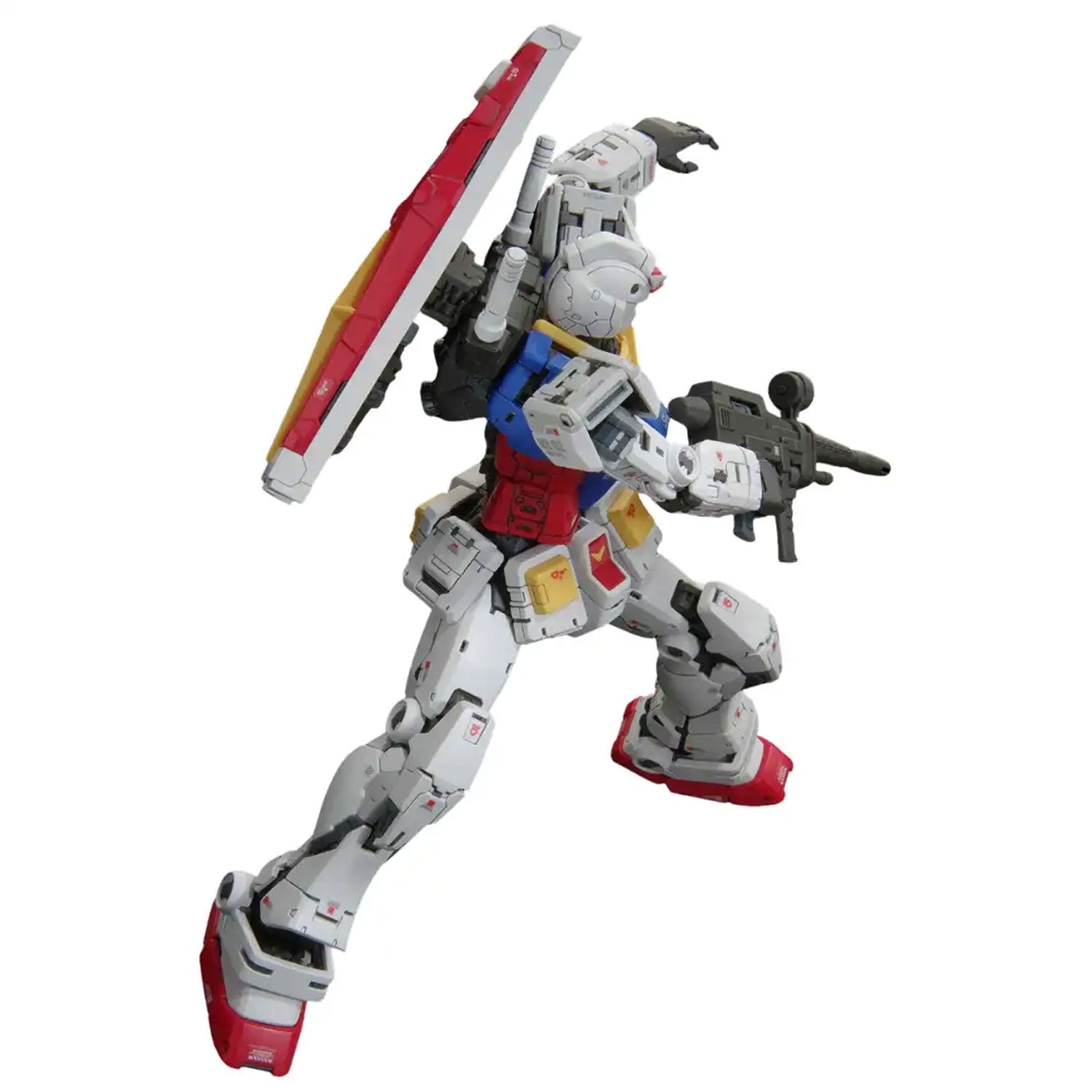 Posable RX-78-2 Gundam model kit in red, white, and blue, holding a rifle and shield in a dynamic action pose.