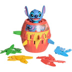 Stitch-themed pop-up barrel game with colorful surfboard-shaped game pieces against a white background.