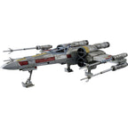 Star Wars X-wing starfighter toy in grey and red with four wings and an R2-D2 droid figure behind the cockpit.